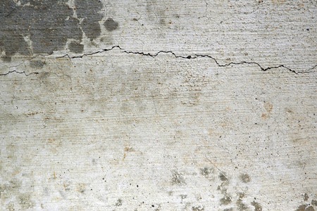 потрескавшийся серый бетон